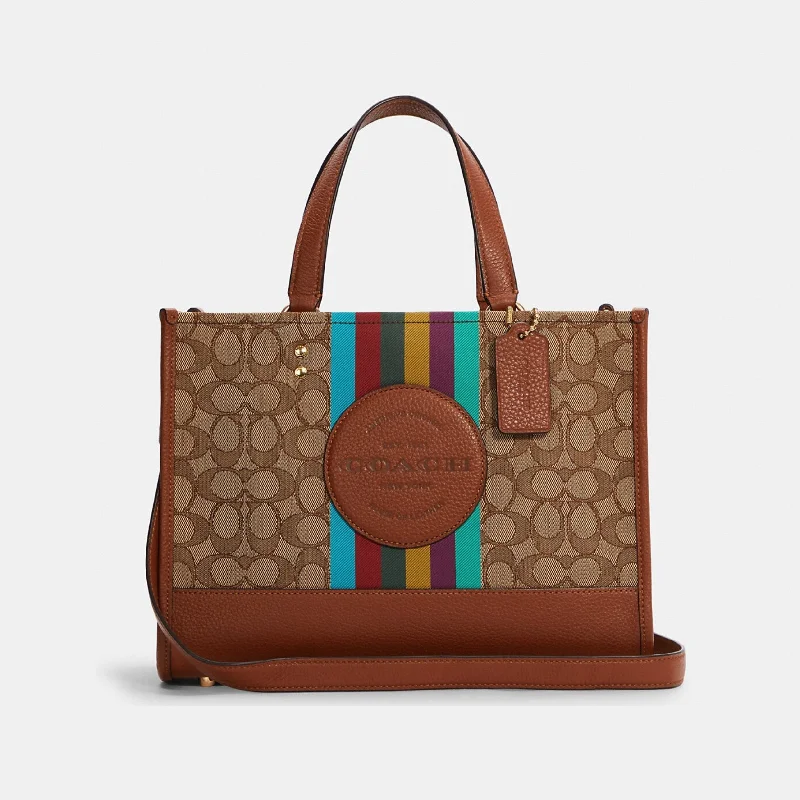 Coach tote bags with a spacious interior and multiple compartments for organizationCoach Dempsey Carryall In Signature Jacquard With Stripe And Coach Patch