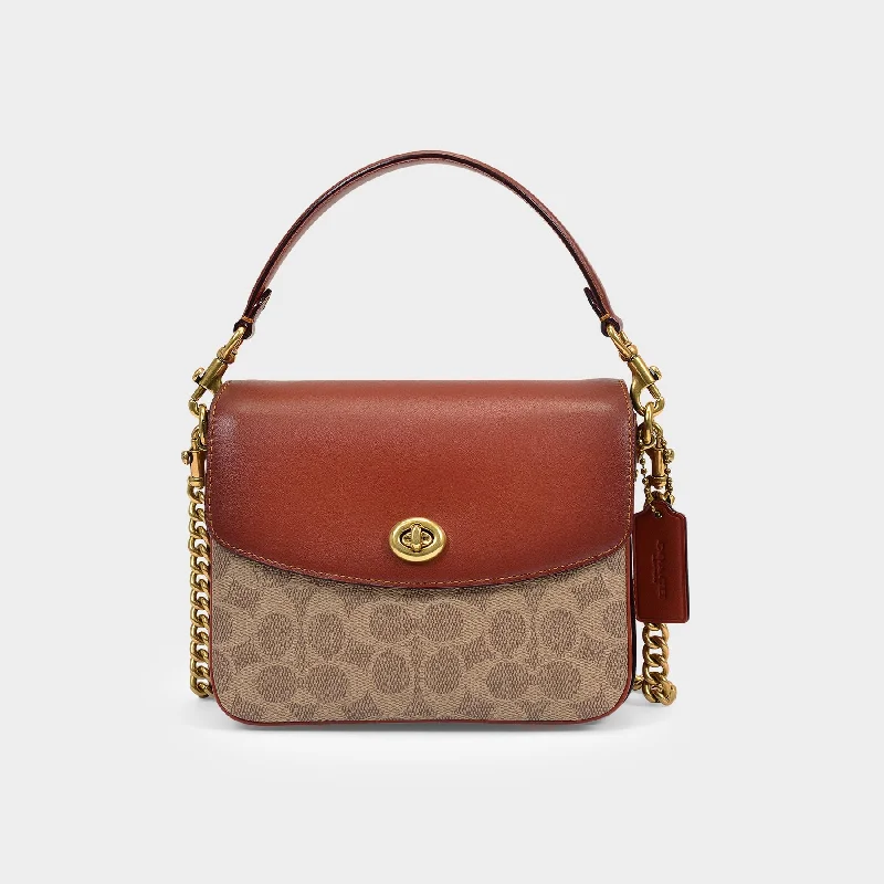 Small - sized Coach crossbody bags in smooth pebble leather for a compact carryCassie 19 Crossbody - Coach - Tan Rust - Canva