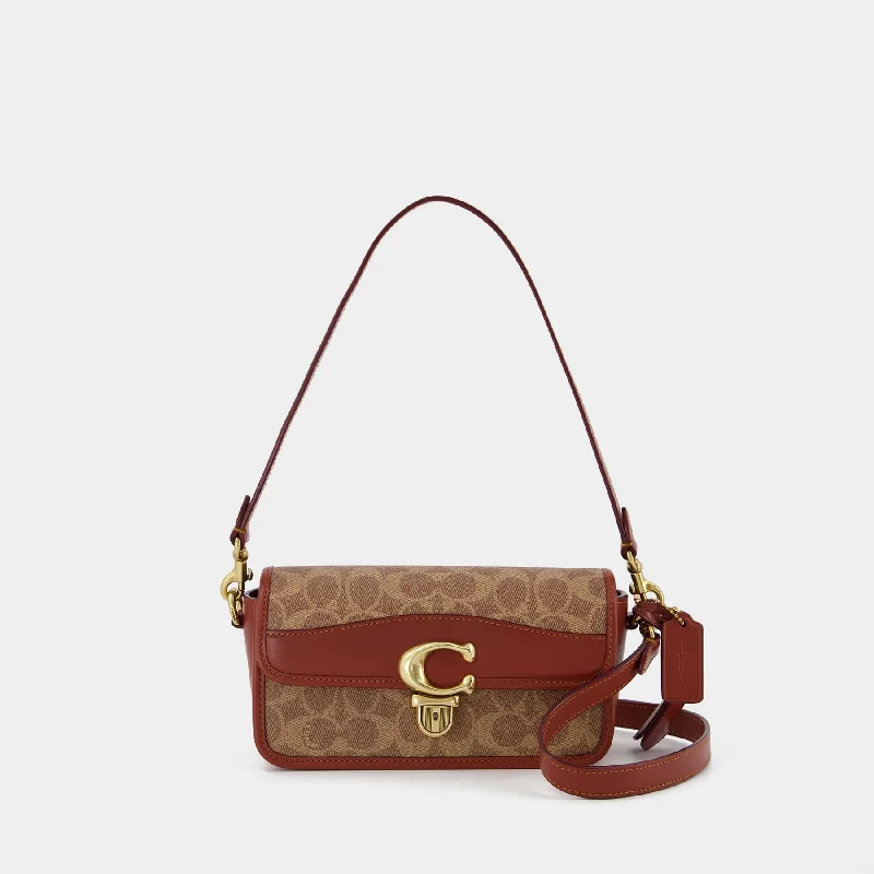 Coach crossbody bags in a vibrant, eye - catching color for a bold statementHobo Studio Baguette - Coach - Leather - Tan Rust