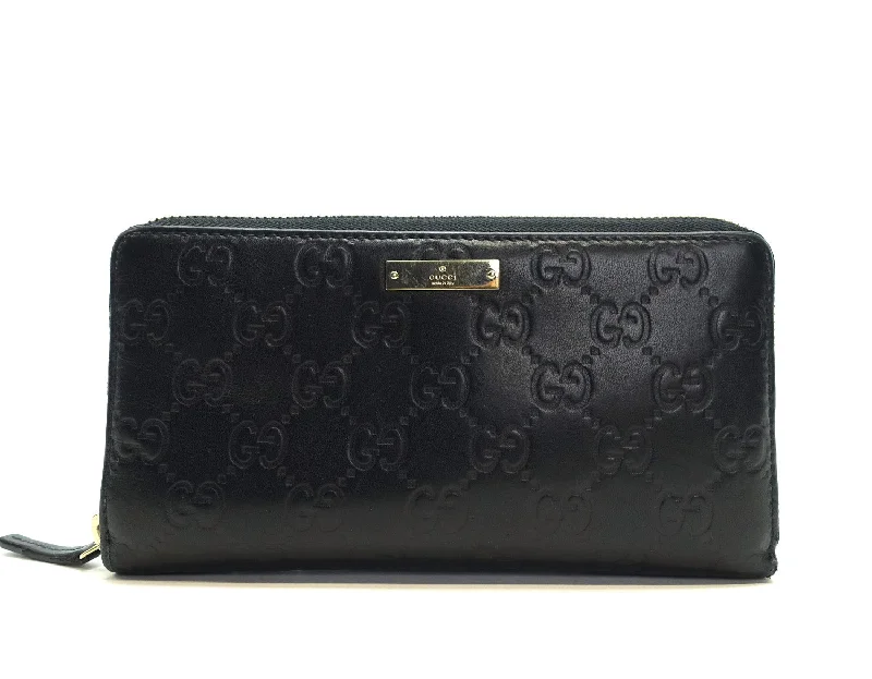 Women Gucci crossbody bags with a woven leather strapMonogram Calf Leather Signature Wallet