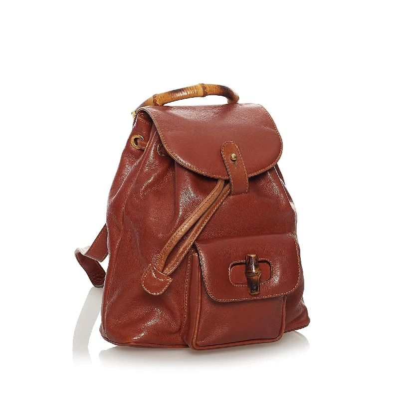 Women Gucci bags with a front - zip pocket for small itemsGucci Bamboo Drawstring Leather Backpack (34099)