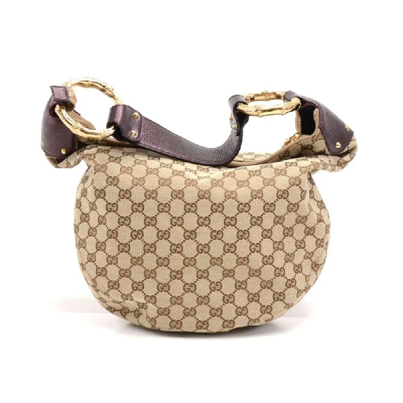 Women Gucci Sylvie bags with a leather - wrapped handleSupreme Monogram Canvas Metal Bamboo Bag