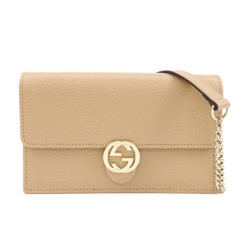 Ladies Gucci shoulder bags with a magnetic - closure flapGUCCI Interlocking G Leather Chain Shoulder Wallet Beige 615523