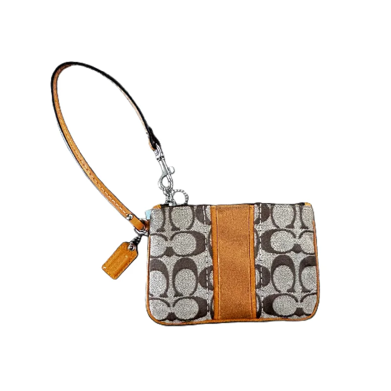 Coach Borough bags with a removable interior organizerWristlet Designer By Coach, Size: Small