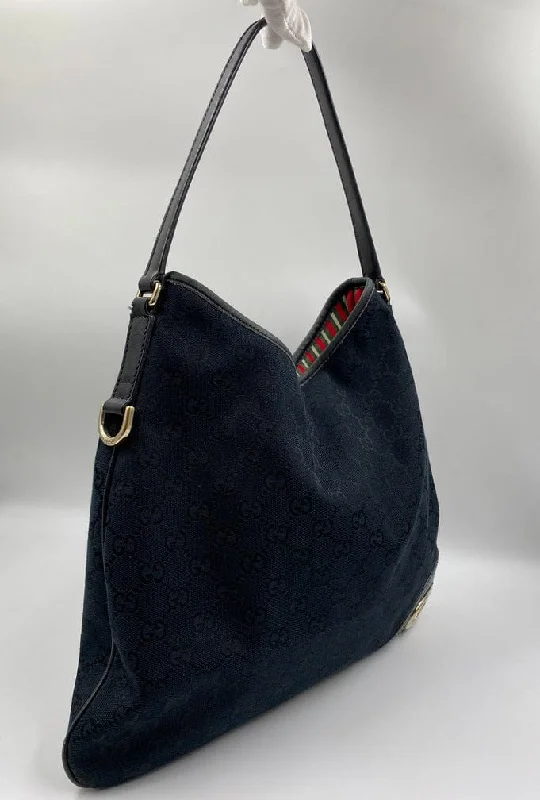 Gucci Marmont bags for women with gold - toned hardwareGucci Vintage Canvas Hobo Tote