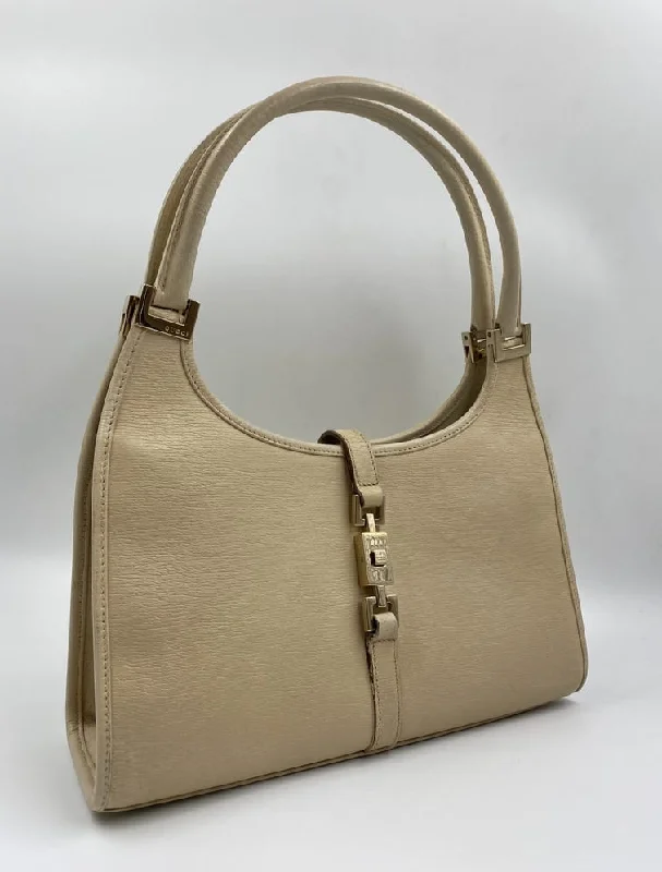 Women Gucci Sylvie bags with a monogram - embossed leatherVintage Gucci Jackie Bag