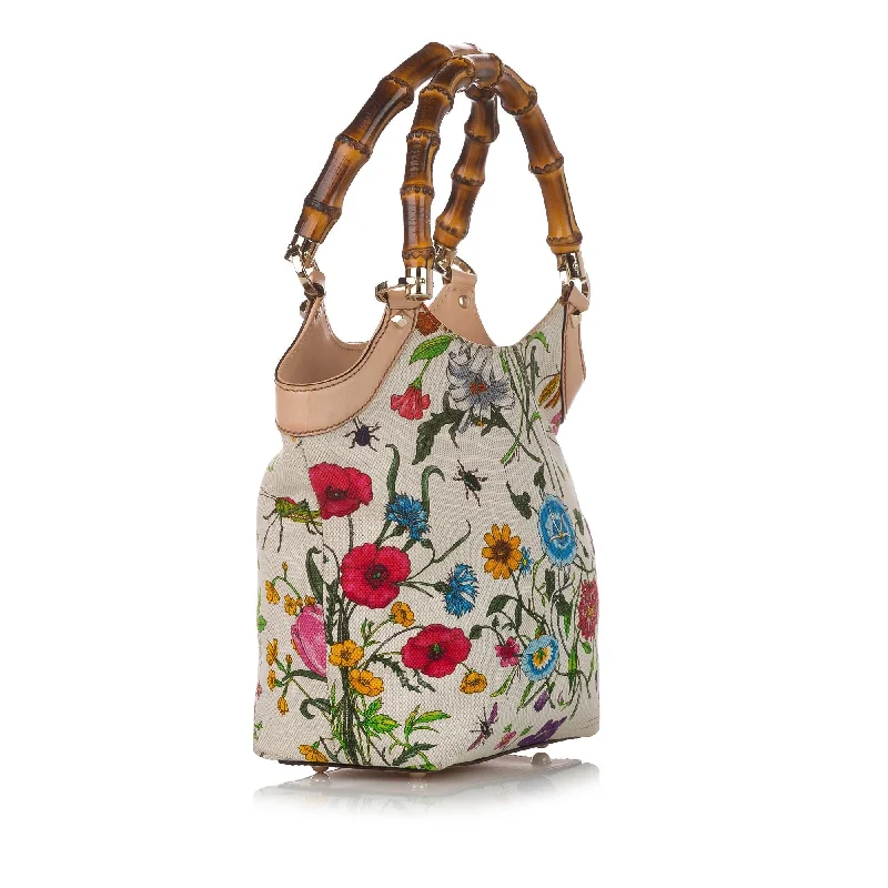 Ladies Gucci Dionysus bags in a pastel colorGucci Bamboo Flora Canvas Handbag (31128)