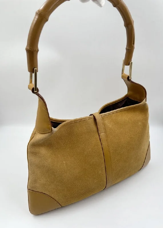 Women Gucci bags with a magnetic snap closure for easy accessVintage Gucci Jackie Bag in Soft Suede with Iconic Bamboo Handle