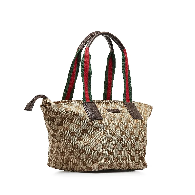 Gucci handbags for women with a metal - framed claspGUCCI GG Canvas Web Shoulder Bag