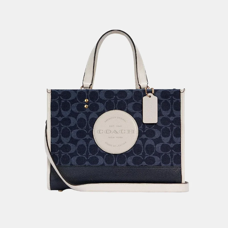 Ladies Coach Tabby bags with gold - toned hardware for a touch of luxuryCoach Dempsey Tote  In Signature Denim With Coach Patch