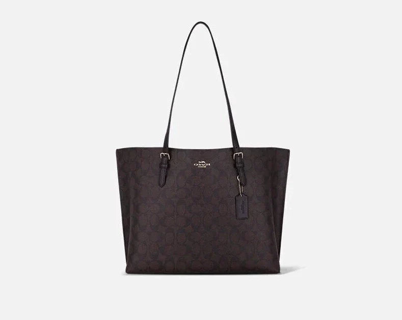 Ladies Coach Tabby bags with a textured leather surface for a more tactile lookCoach Mollie Tote In Signature Canvas Gold/Brown Black