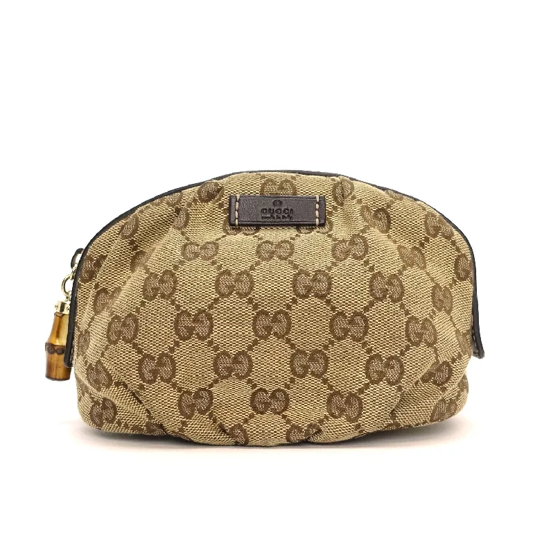 Women Gucci Sylvie bags with a monogram - embossed leatherSupreme Monogram Canvas Medium Cosmetic Bag