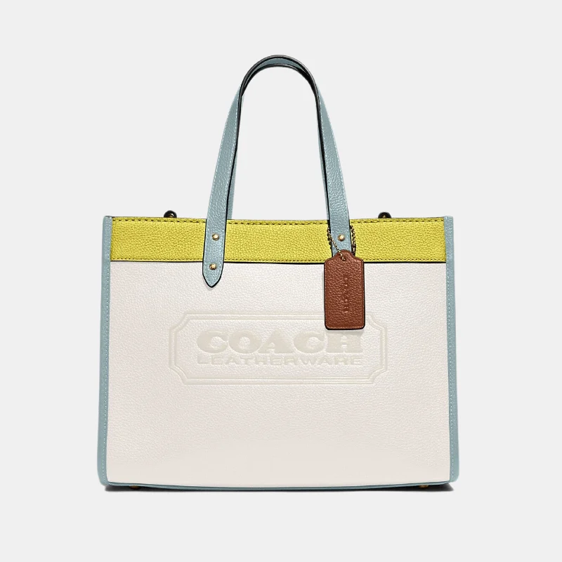 Coach bags with a zippered interior pocket for separating itemsCoach Field Tote 30 In Colorblock With Coach Badge