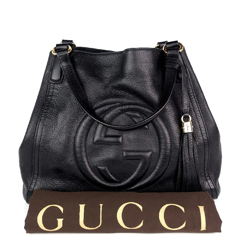 Women Gucci tote bags in GG Supreme canvas for a branded feelSoho Calf Leather Medium Tassel Bag