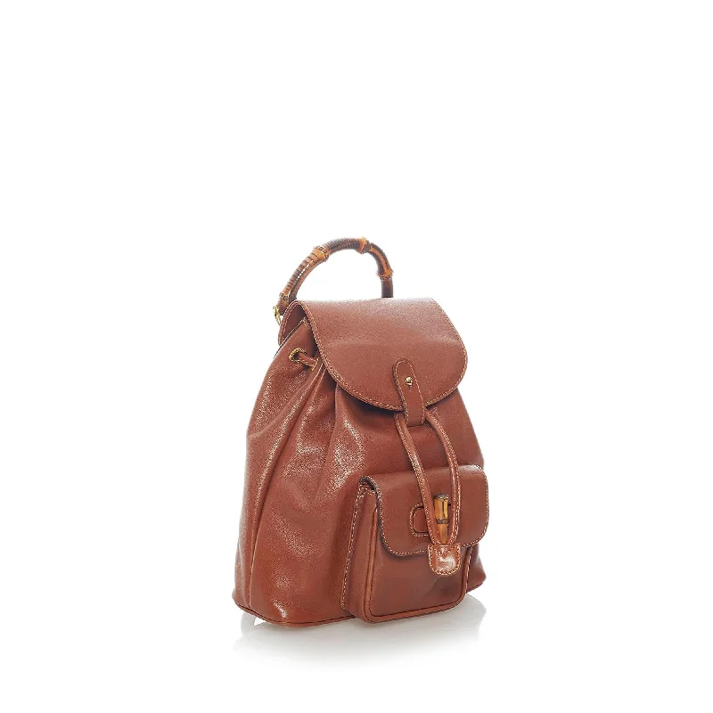 Women Gucci Sylvie bags featuring the signature web stripeGucci Bamboo Drawstring Leather Backpack (36155)