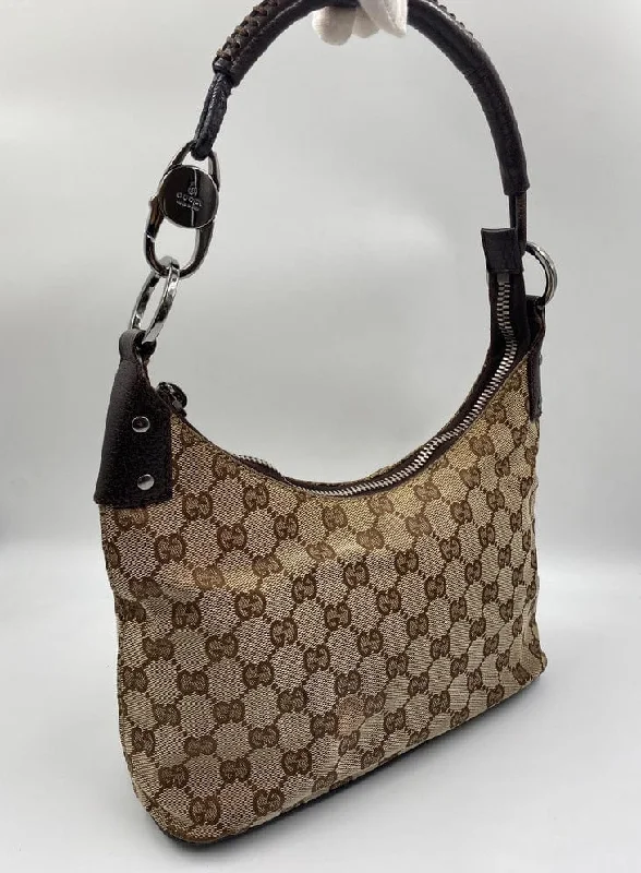 Gucci Marmont bags for women with a contrast - colored interiorGucci Vintage Logo Canvas Shoulder Bag