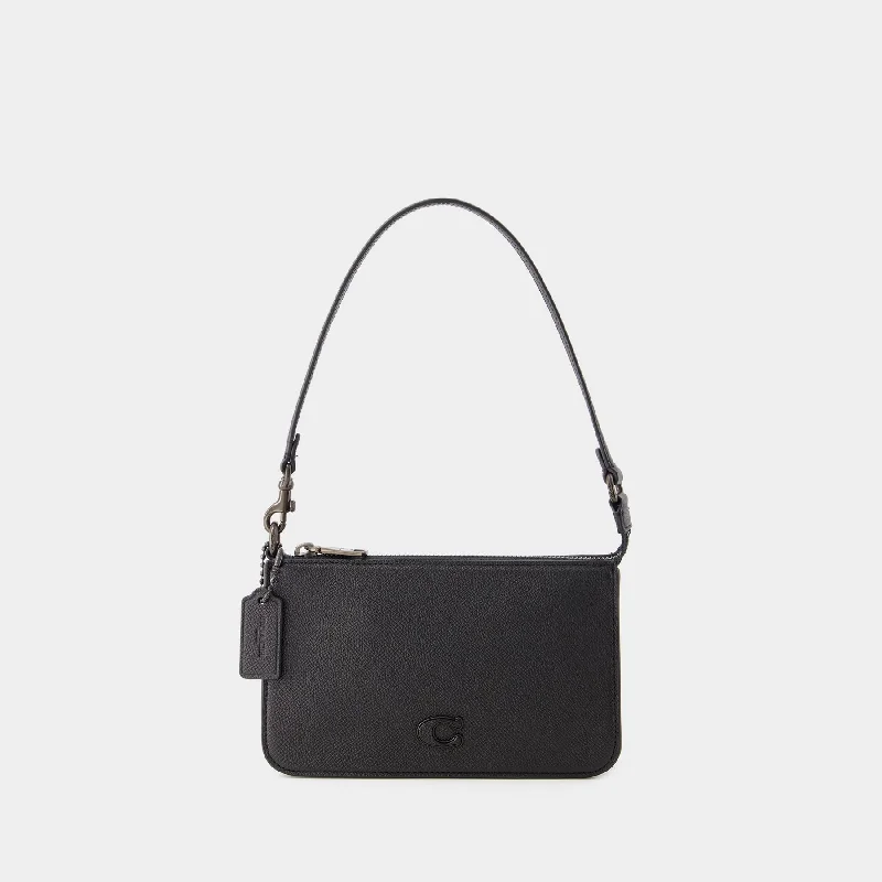 Small - sized Coach crossbody bags in smooth pebble leather for a compact carryPouch Bag - Coach - Leather - Black