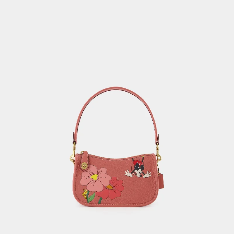 Coach bags with a detachable mobile phone holder for on - the - go useHobo Swinger 22 Disney bag - Coach - Leather - Pink