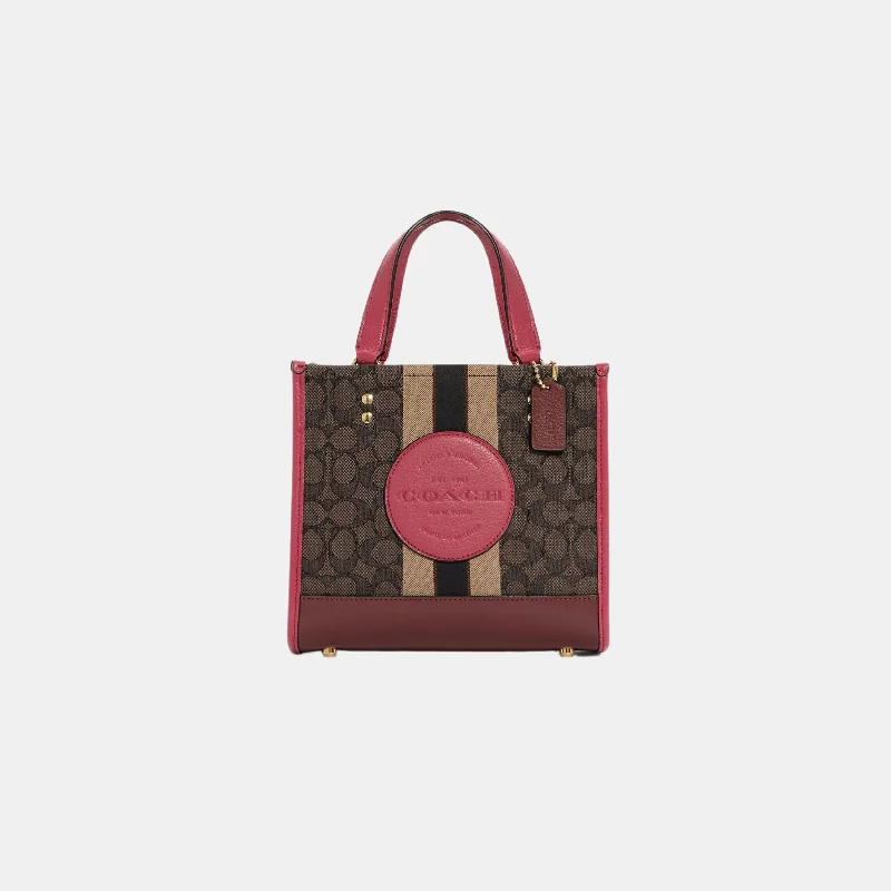 Coach Rogue bags featuring the signature C - hardware for a branded lookCoach Dempsey Tote 22 In Signature Jacquard With Coach Patch And Stripe