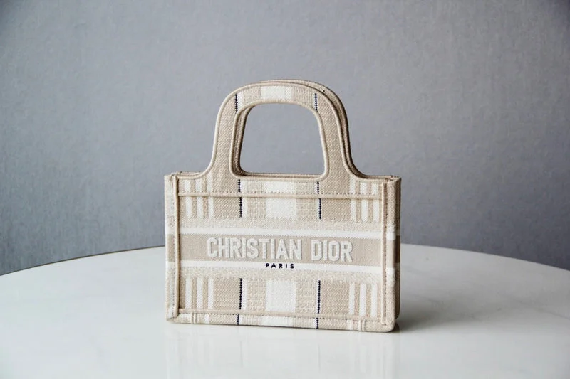 Christian Dior Saddle bags with a studded trim for a bold lookChristian Dior  Bags - 3833