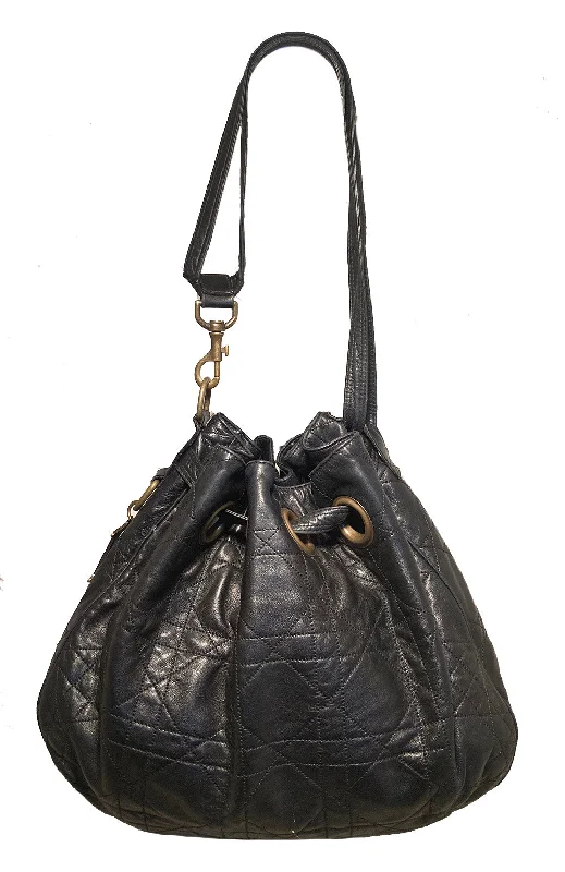 Christian Dior handbags with a snap - button closure and a decorative buckleChristian Dior Black Leather Cannage Drawstring Shoulder Bag