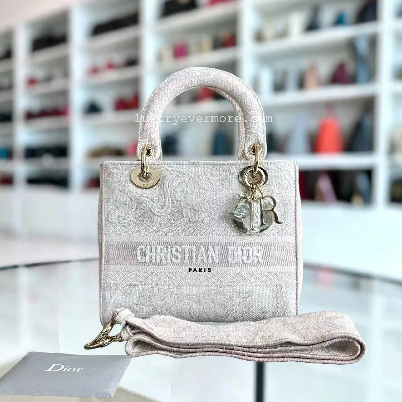 Christian Dior tote bags with a printed Dior logo on the frontD-lite Toile De Jouy Embroidery Light Pink Golden Hardware